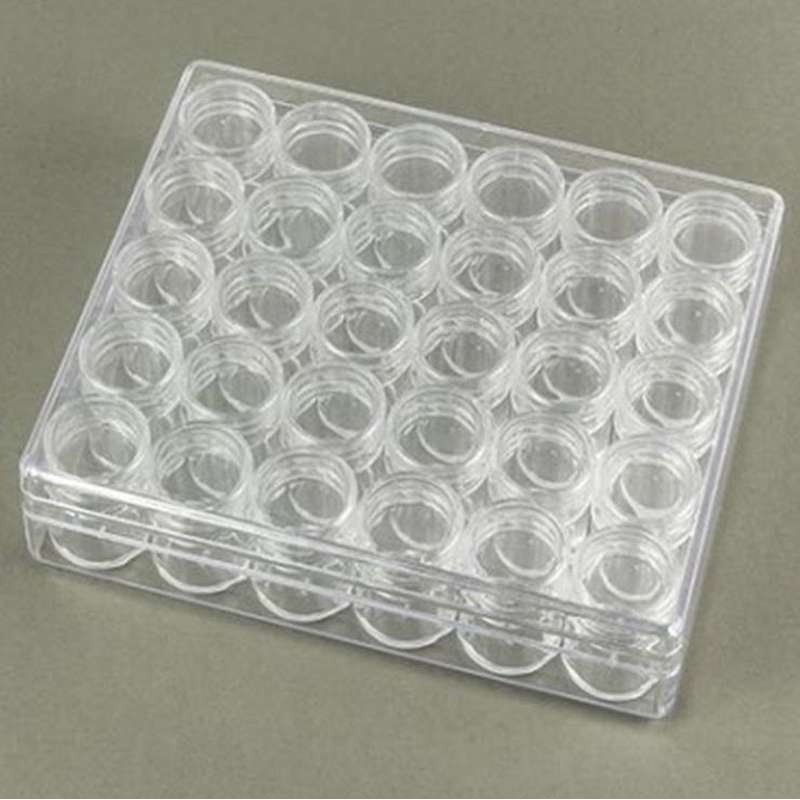 Opbergdoos met 30 ronde doosjes  transp.